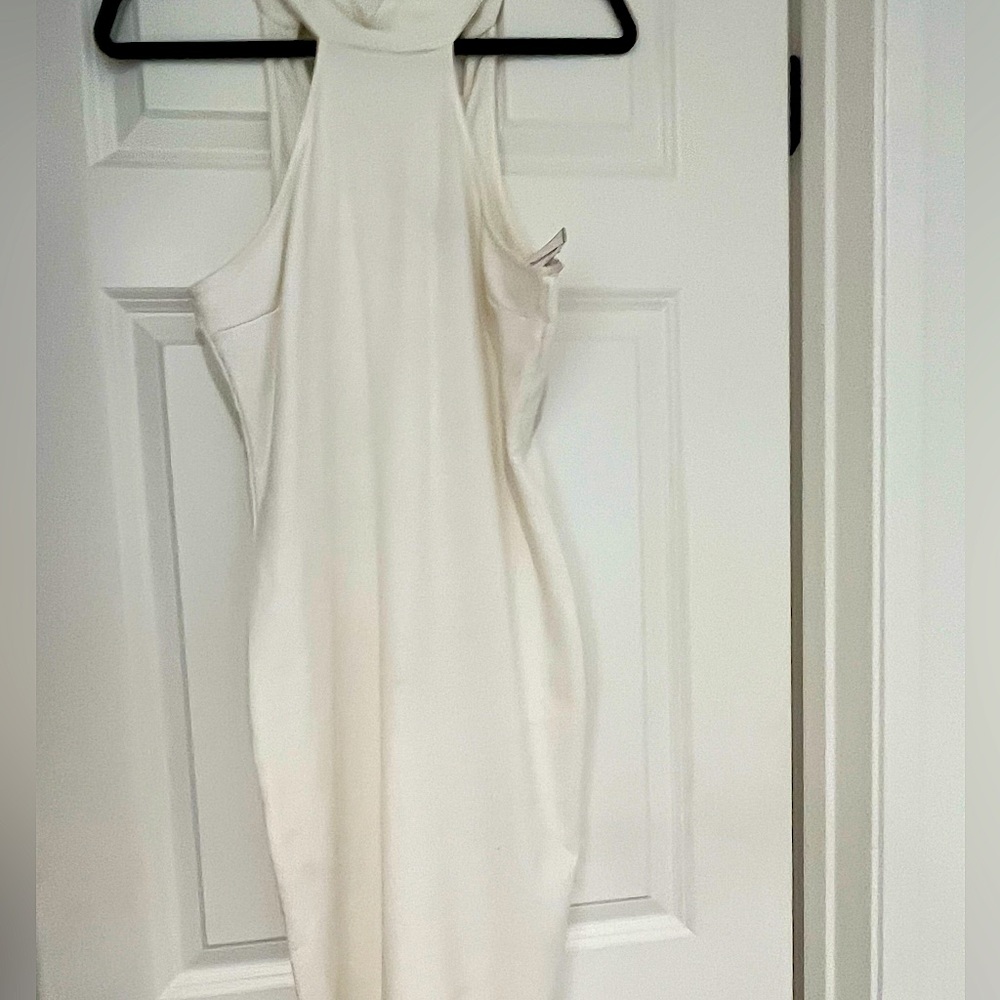 Never worn. Downsizing